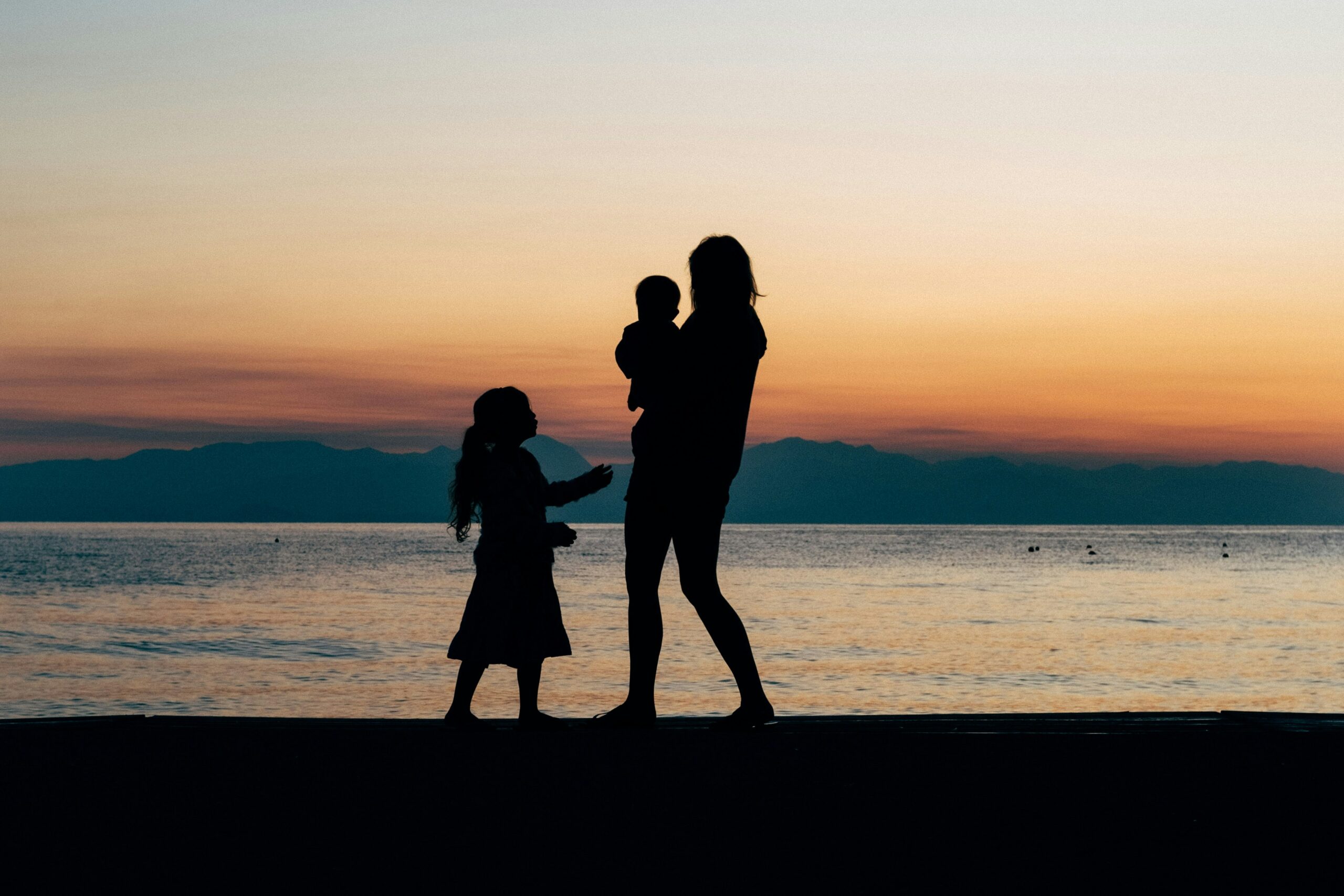 Family watching the sunset