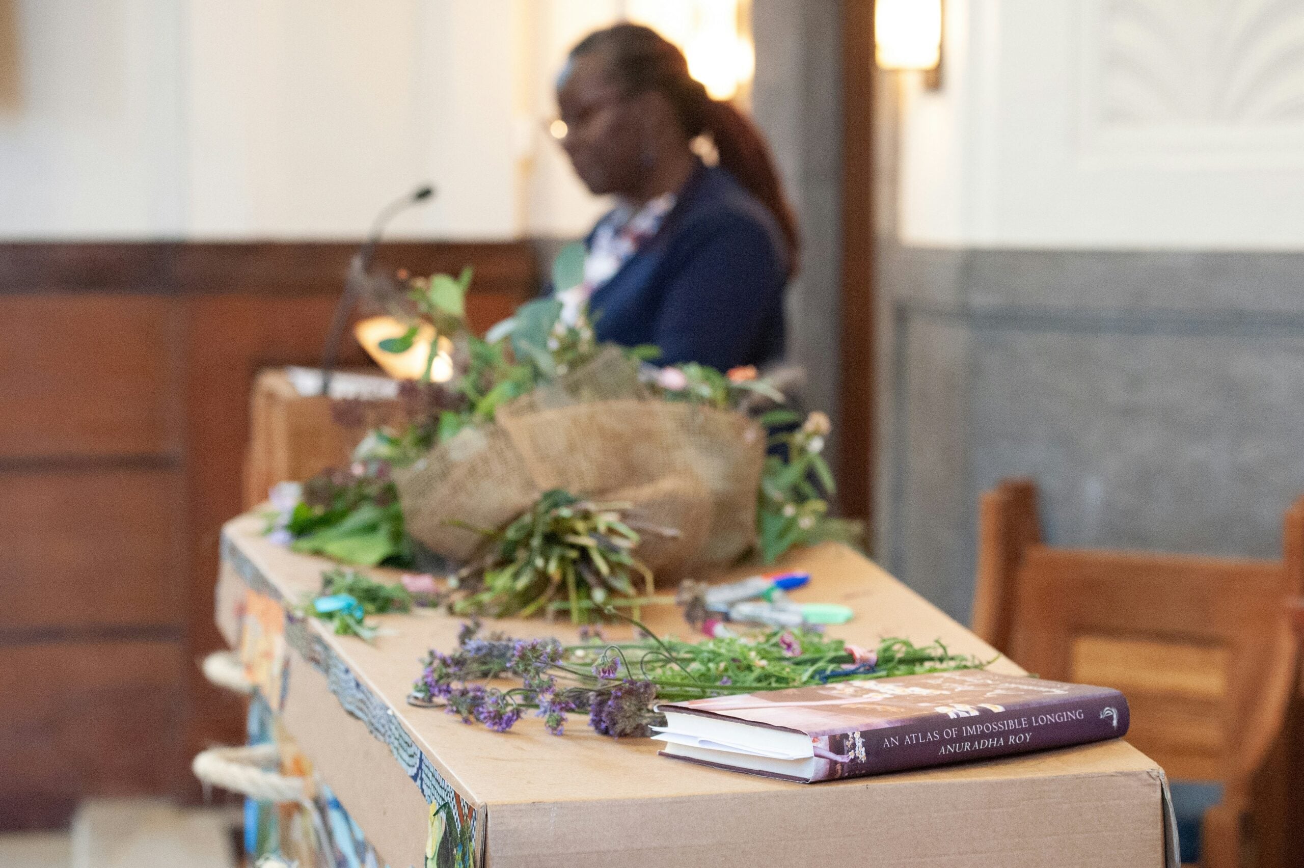 Celebrant Behind a Coffin at a Funeral