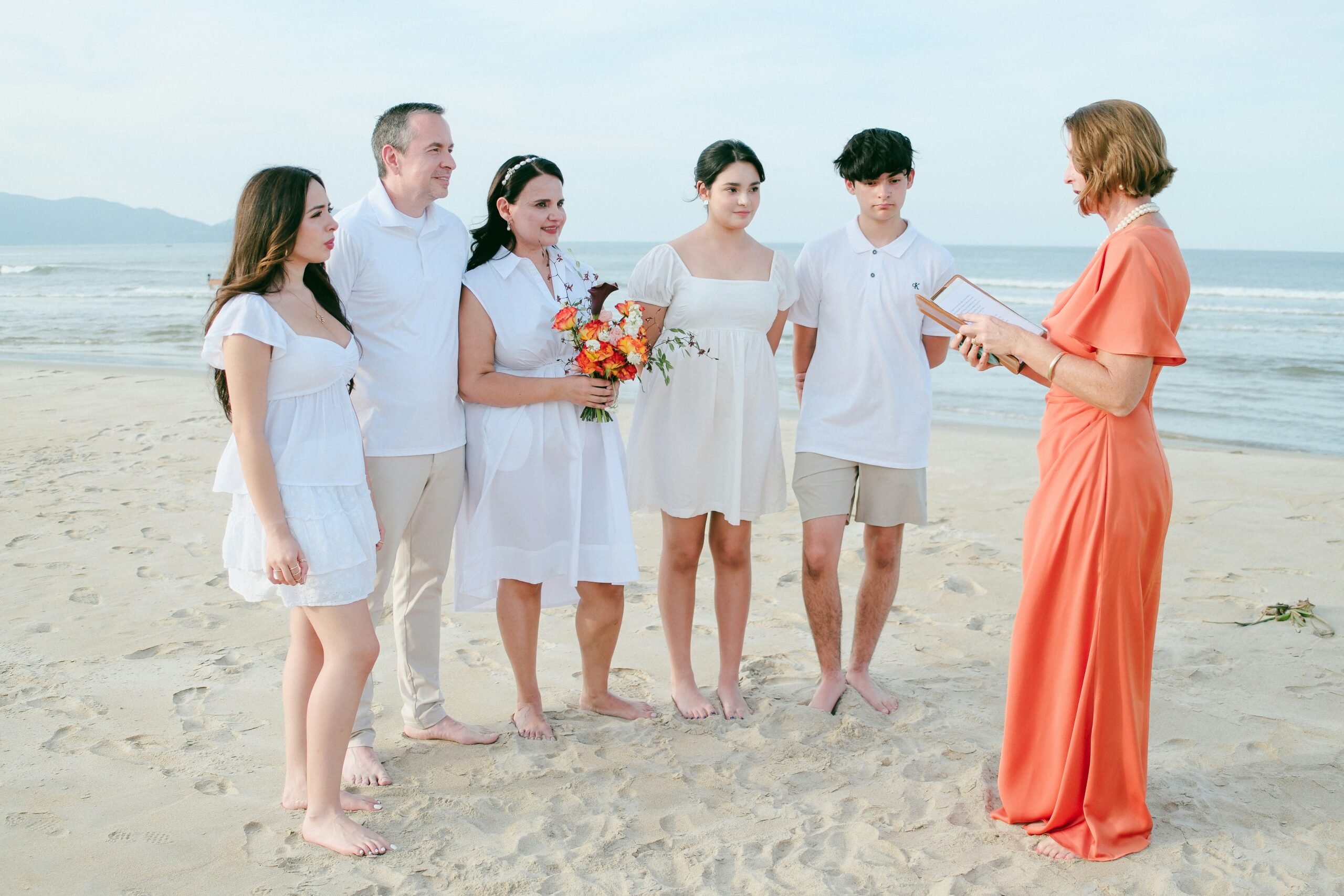 Family ceremony on a beach