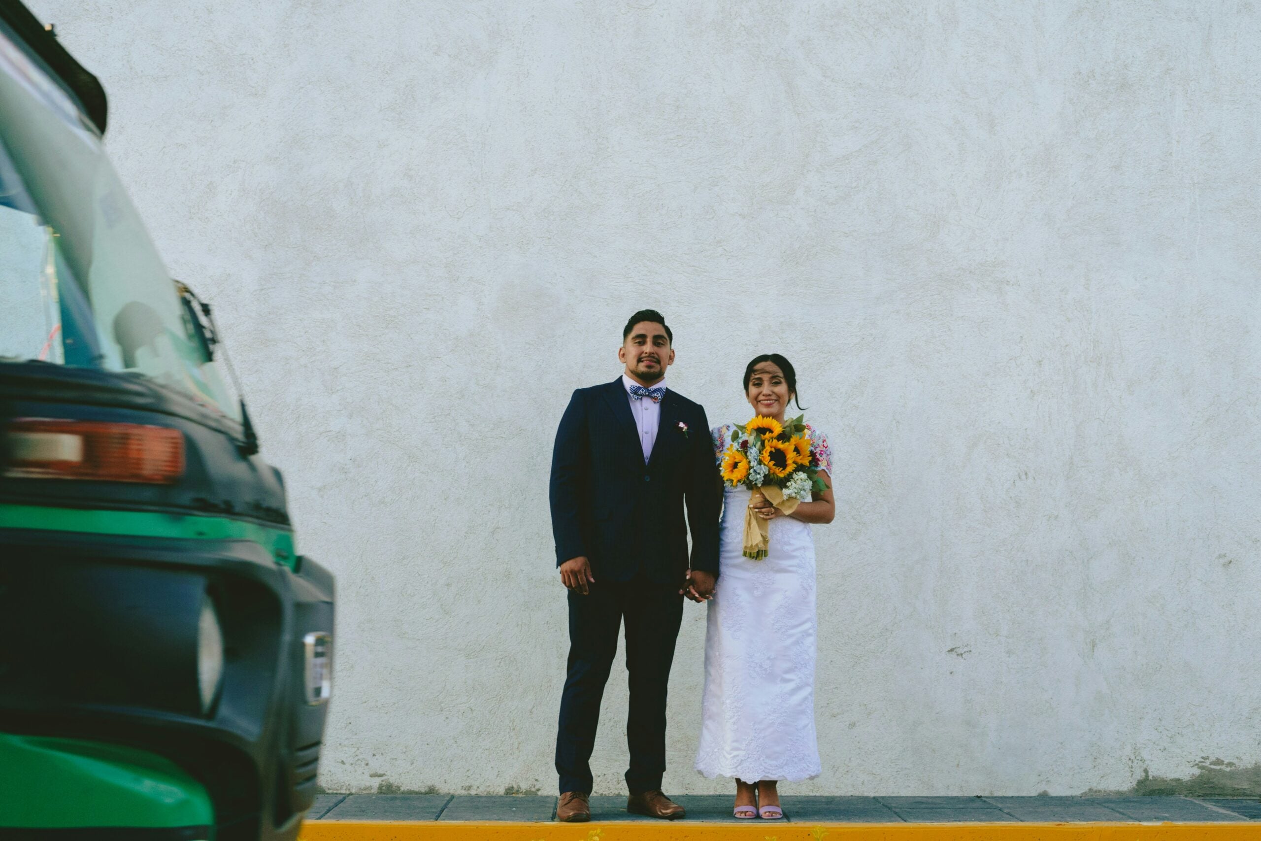 Married couple with sunflowers