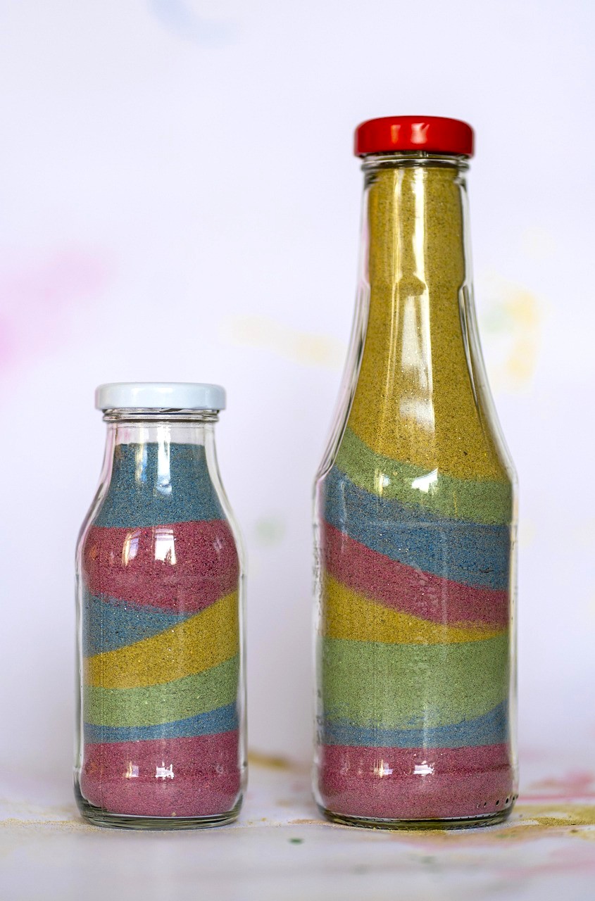 Bottles of coloured sand