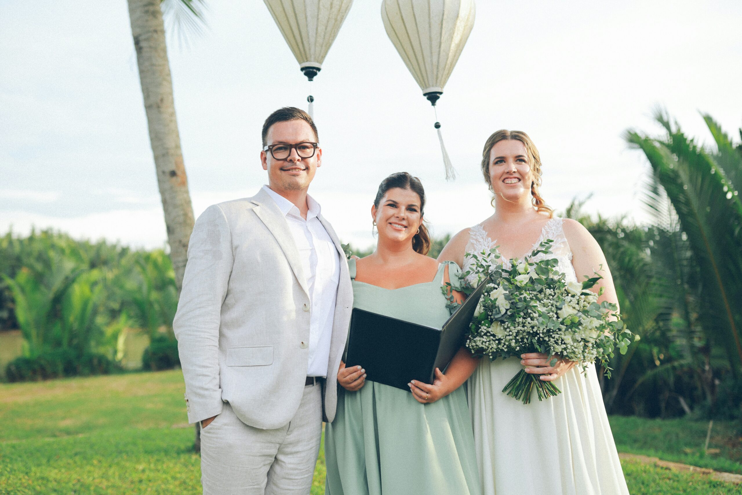 Couple with their wedding celebrant