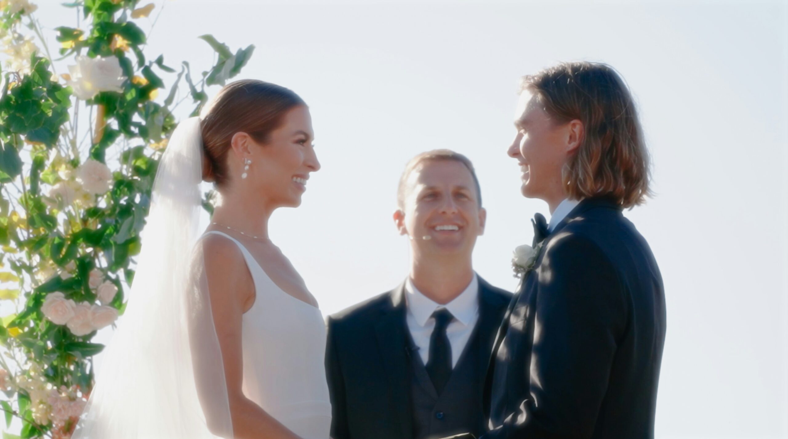Couple with wedding celebrant
