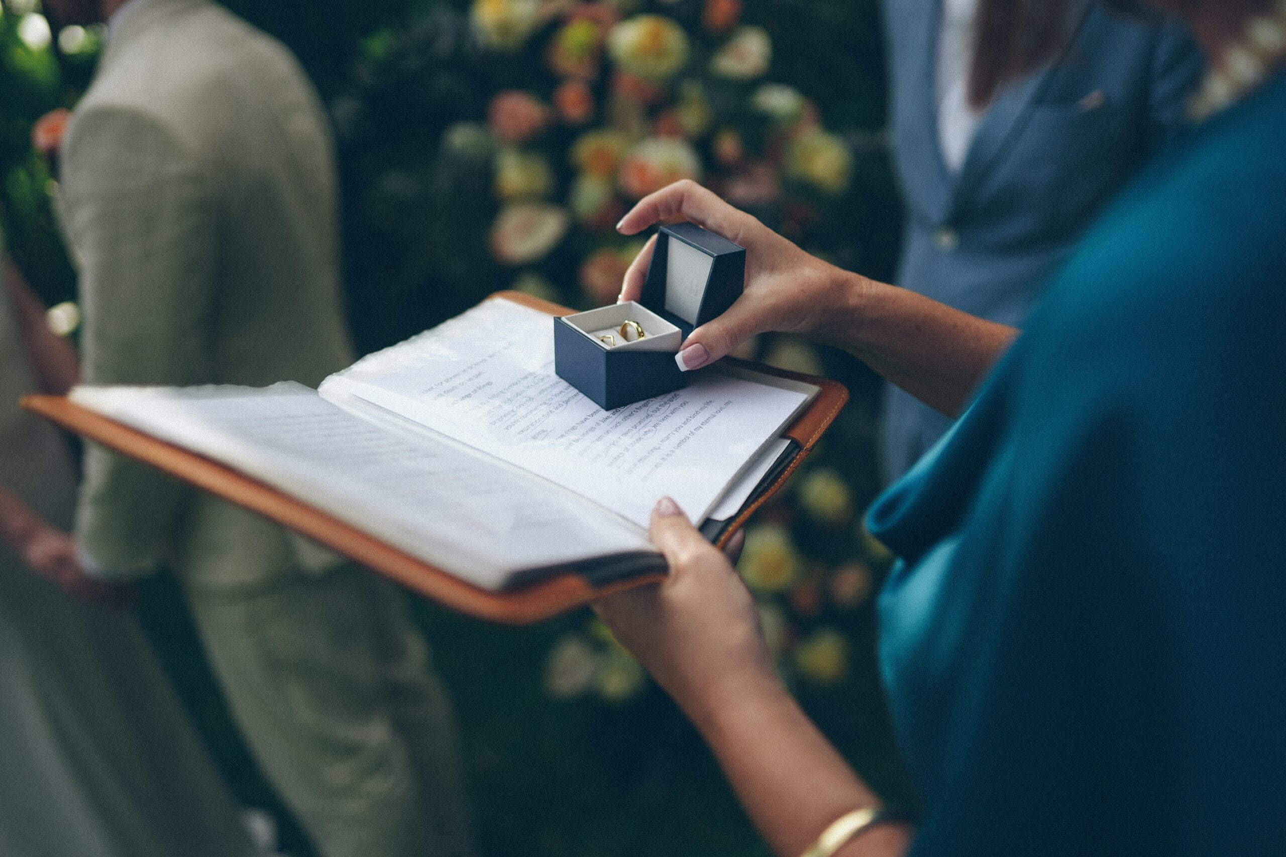 Celebrant holding wedding rings